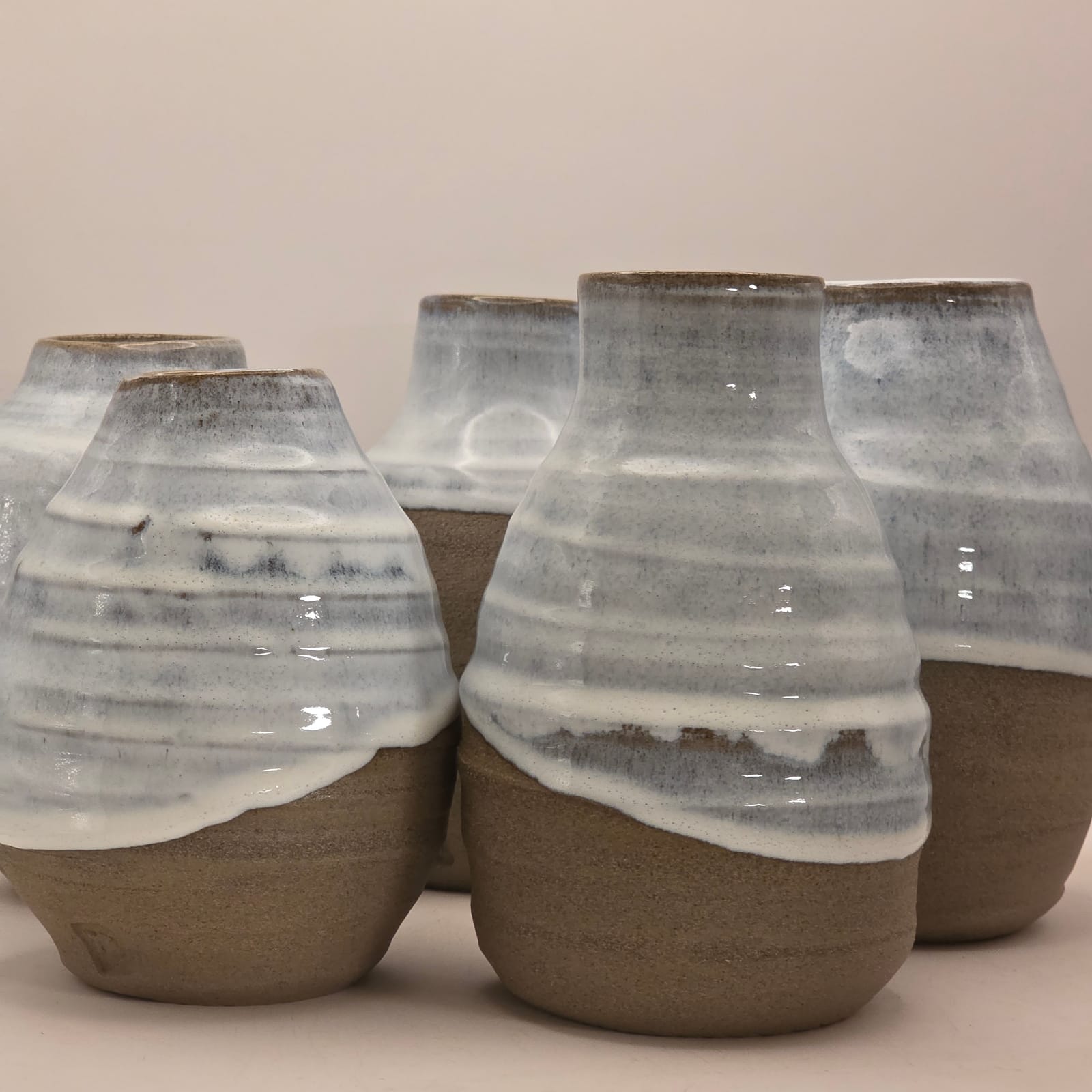 A group of white ceramic vases by Marakima